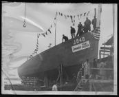 Starboard side view of BYMS-40, launching.  Barbour boat works.New Bern, NC.  Photo attached to glass is broken on bottome left corner